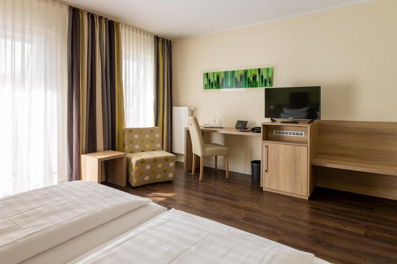 Hotel Am Schlosspark Garni هوسوم المظهر الخارجي الصورة